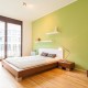 Immobilien Fotograf Köln; Etagenwohnung Schlafzimmer Wand grün